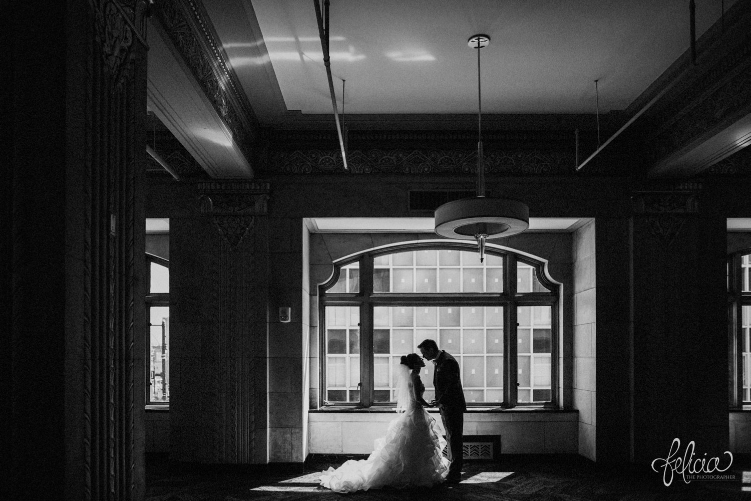 images by feliciathephotographer.com | destination wedding photographer | the grand hall at power and light | kansas city | missouri | downtown | glamorous | multicultural | black and white | romantic | first look | symmetrical | 