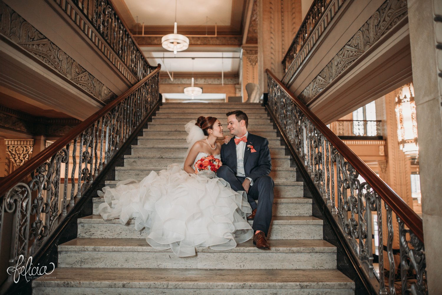 images by feliciathephotographer.com | destination wedding photographer | the grand hall at power and light | kansas city | missouri | downtown | glamorous | multicultural | details | first look | peach | romantic | symmetrical | iron railings | 