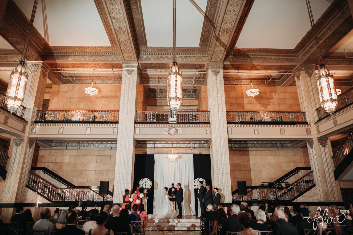 images by feliciathephotographer.com | destination wedding photographer | the grand hall at power and light | kansas city | missouri | downtown | glamorous | multicultural | ceremony | chandelier | venue | details | 