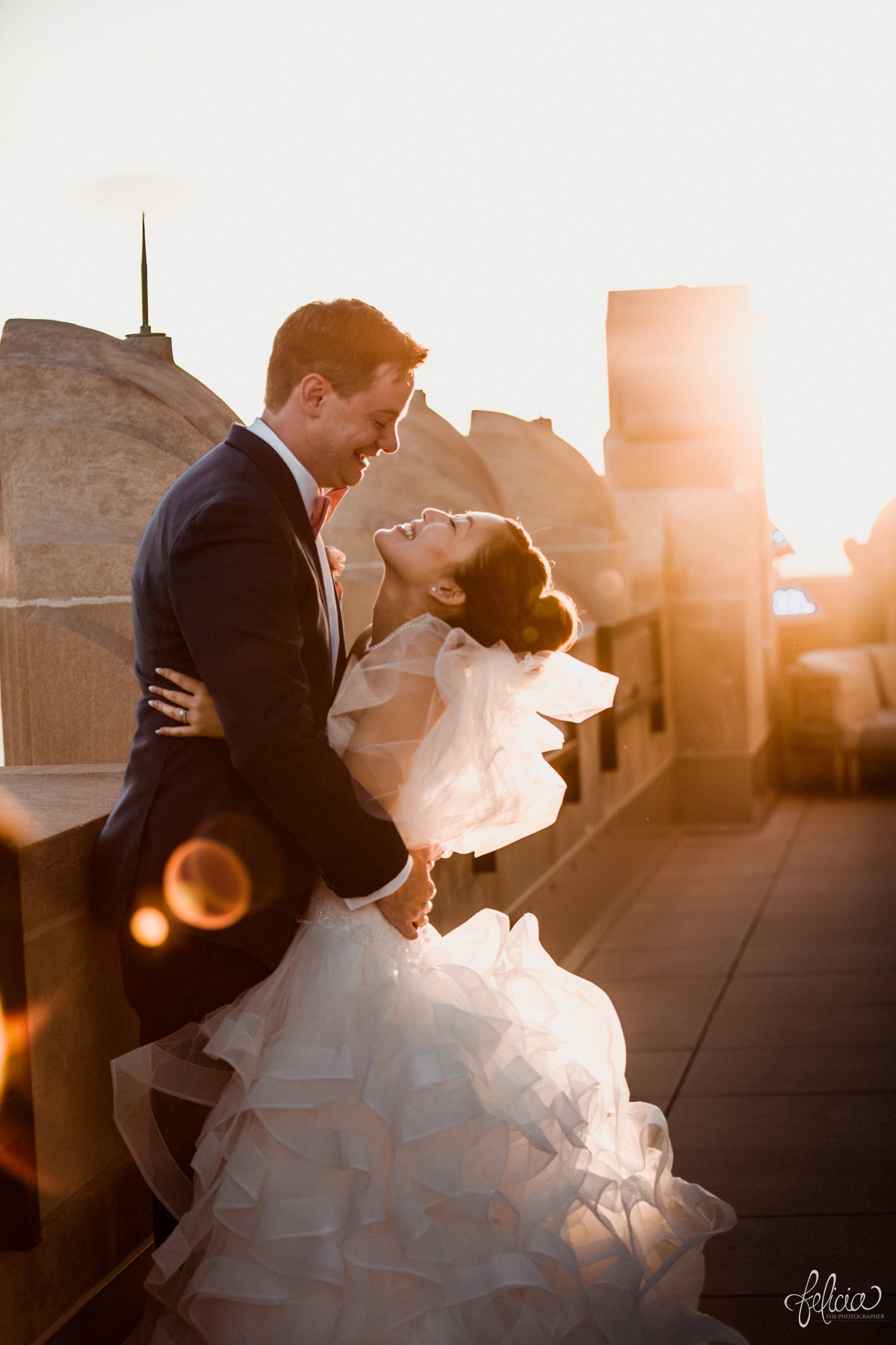 images by feliciathephotographer.com | destination wedding photographer | the grand hall at power and light | kansas city | missouri | downtown | glamorous | multicultural | rooftop | golden hour | sunset | pearls | romantic | couple portrait | city view | 