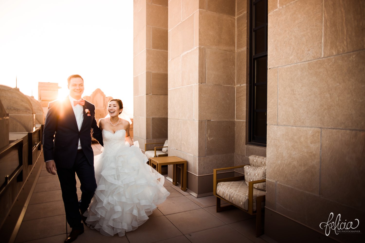 images by feliciathephotographer.com | destination wedding photographer | the grand hall at power and light | kansas city | missouri | downtown | glamorous | multicultural | rooftop | golden hour | sunset | pearls | romantic | couple portrait | city view | laughter | joy | 