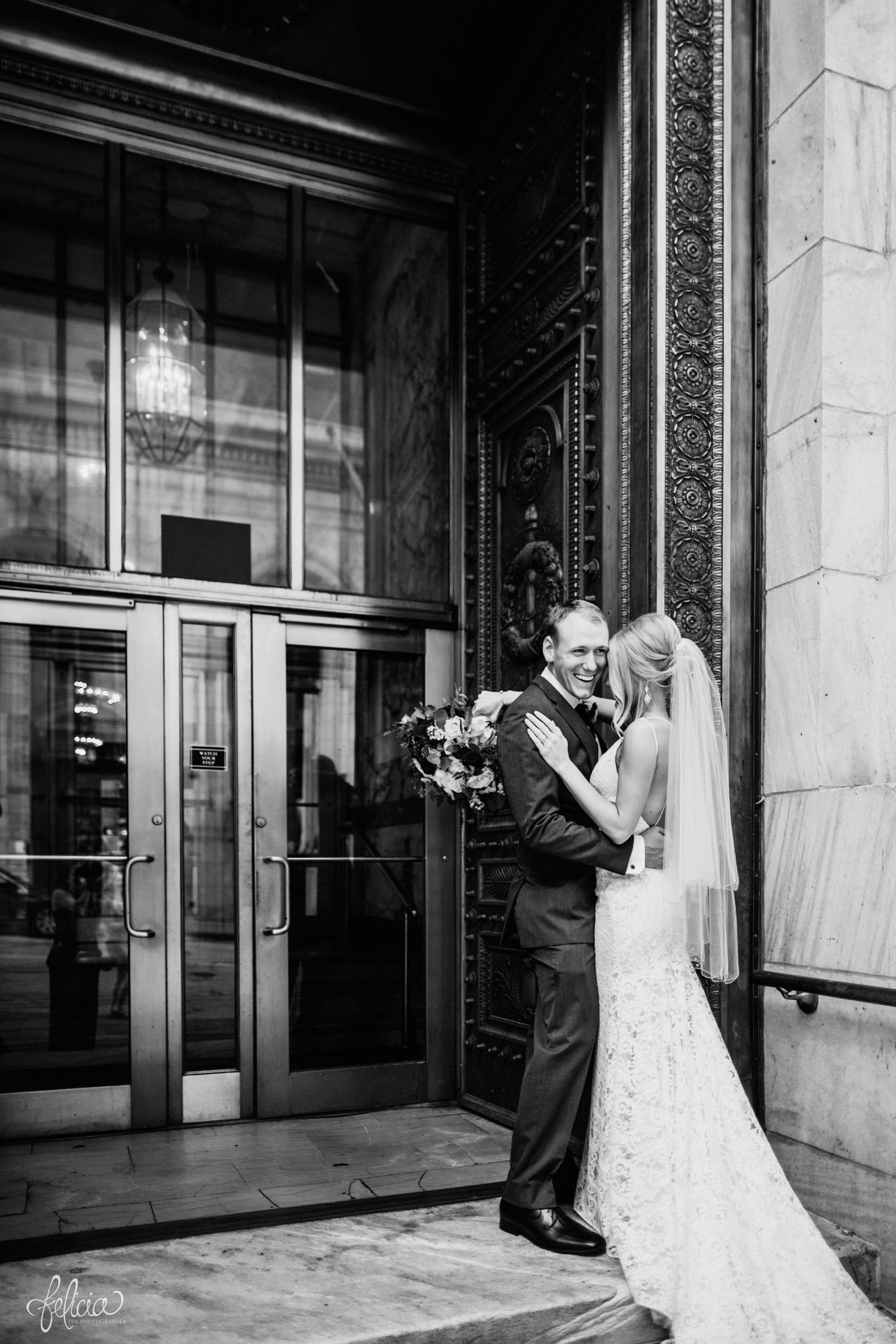 images by feliciathephotographer.com | destination wedding photographer | kansas city | couple portraits | bride and groom | public library | full florals | light pink and red | wild hill | lace dress | fabulous frocks | tip top tix | grey suit | black and white | laughter | 