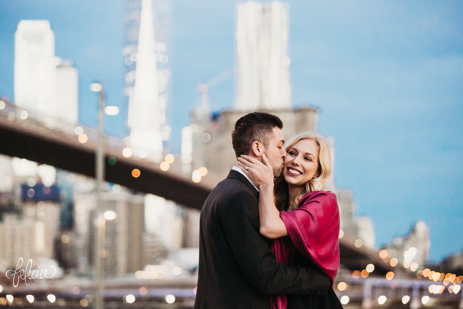 images by feliciathephotographer.com | destination wedding photographer | engagement | new york city | brooklyn bridge | skyline | formal | classic | true love | romantic | cuddles | pearls | diamond ring | urban | joyful | 