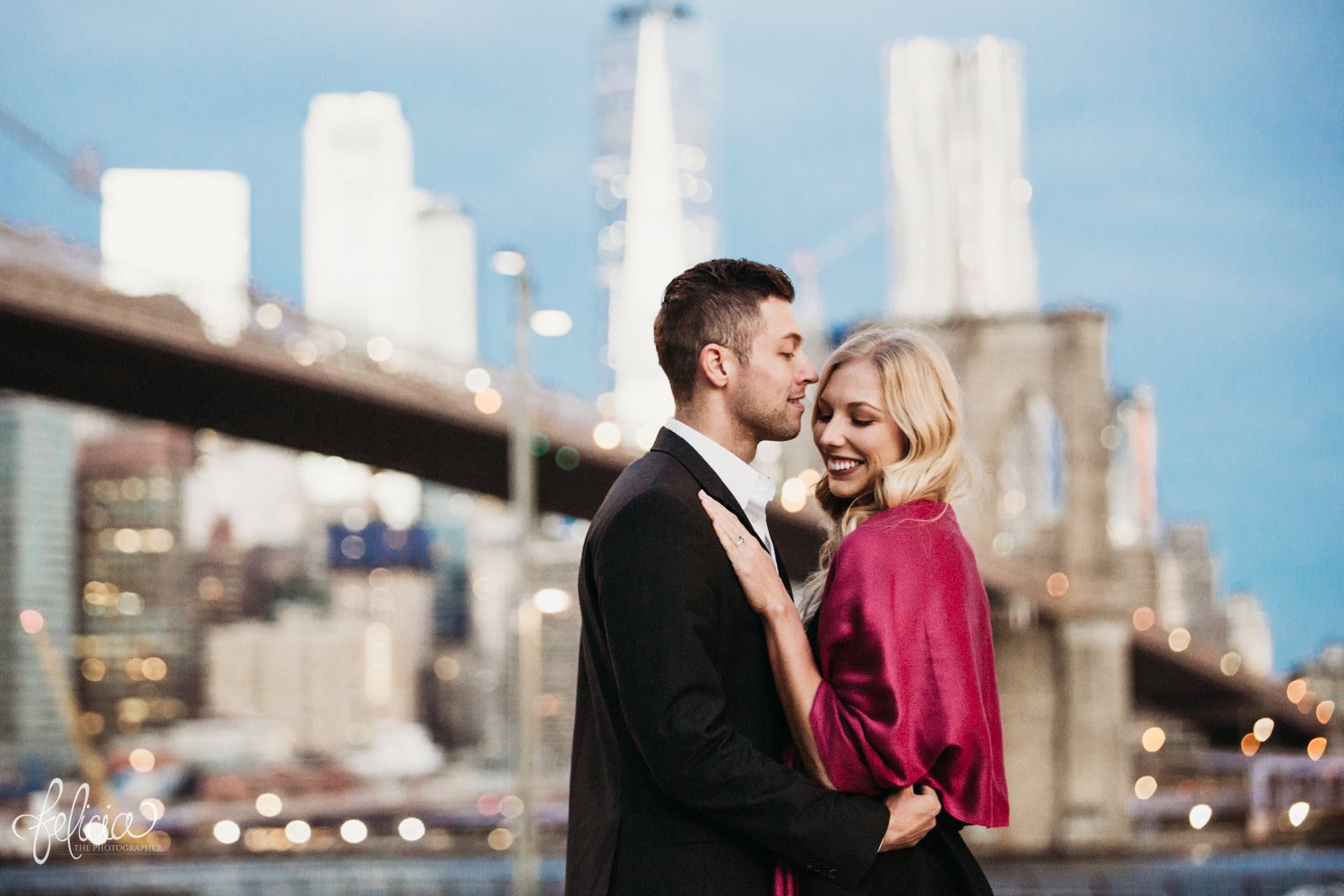 images by feliciathephotographer.com | destination wedding photographer | engagement | new york city | brooklyn bridge | skyline | formal | classic | true love | romantic | cuddles | pearls | diamond ring | urban | 