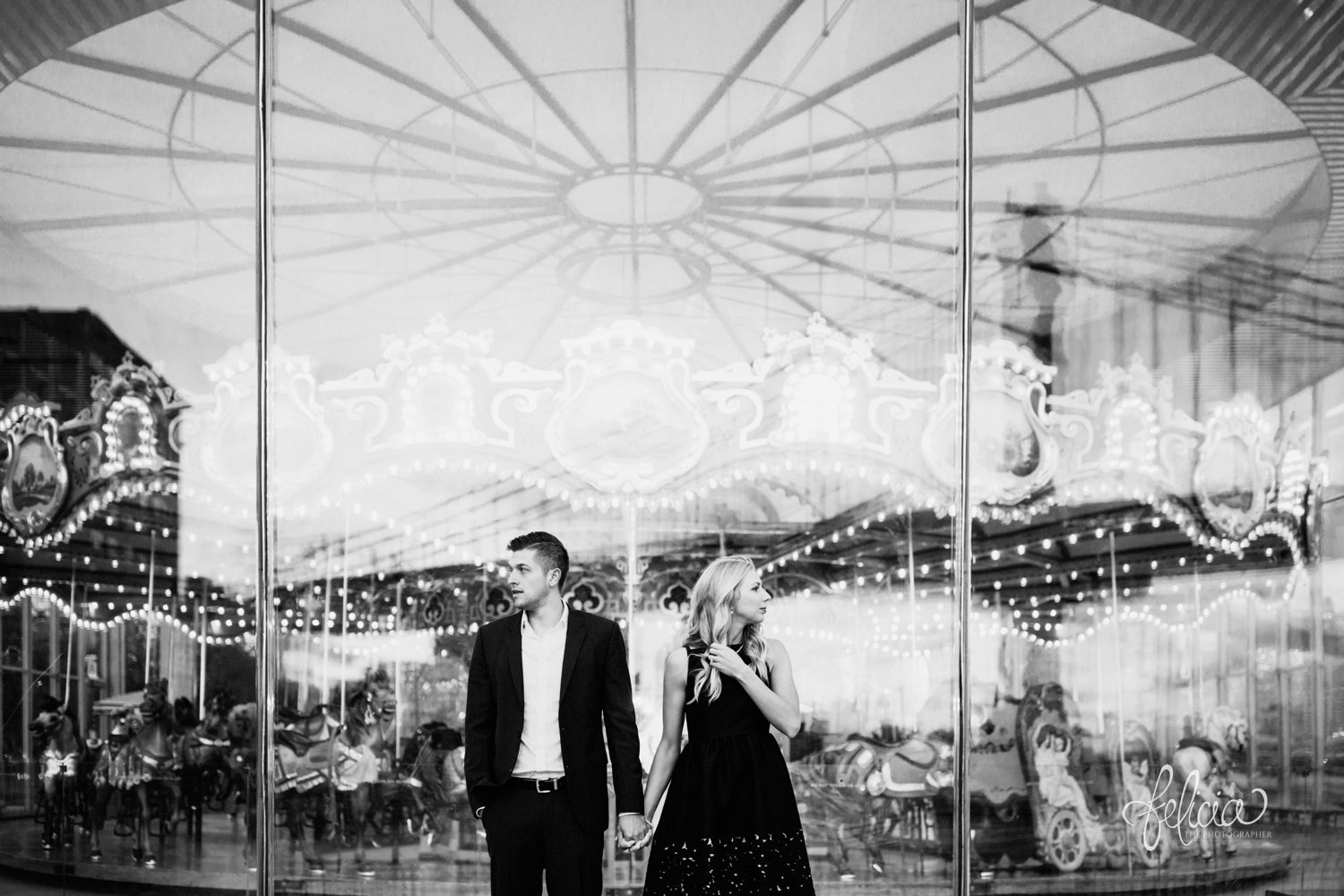 images by feliciathephotographer.com | destination wedding photographer | engagement | new york city | brooklyn bridge | skyline | formal | classic | true love | romantic | black and white | symmetry | carnival | merry go round | circus | 