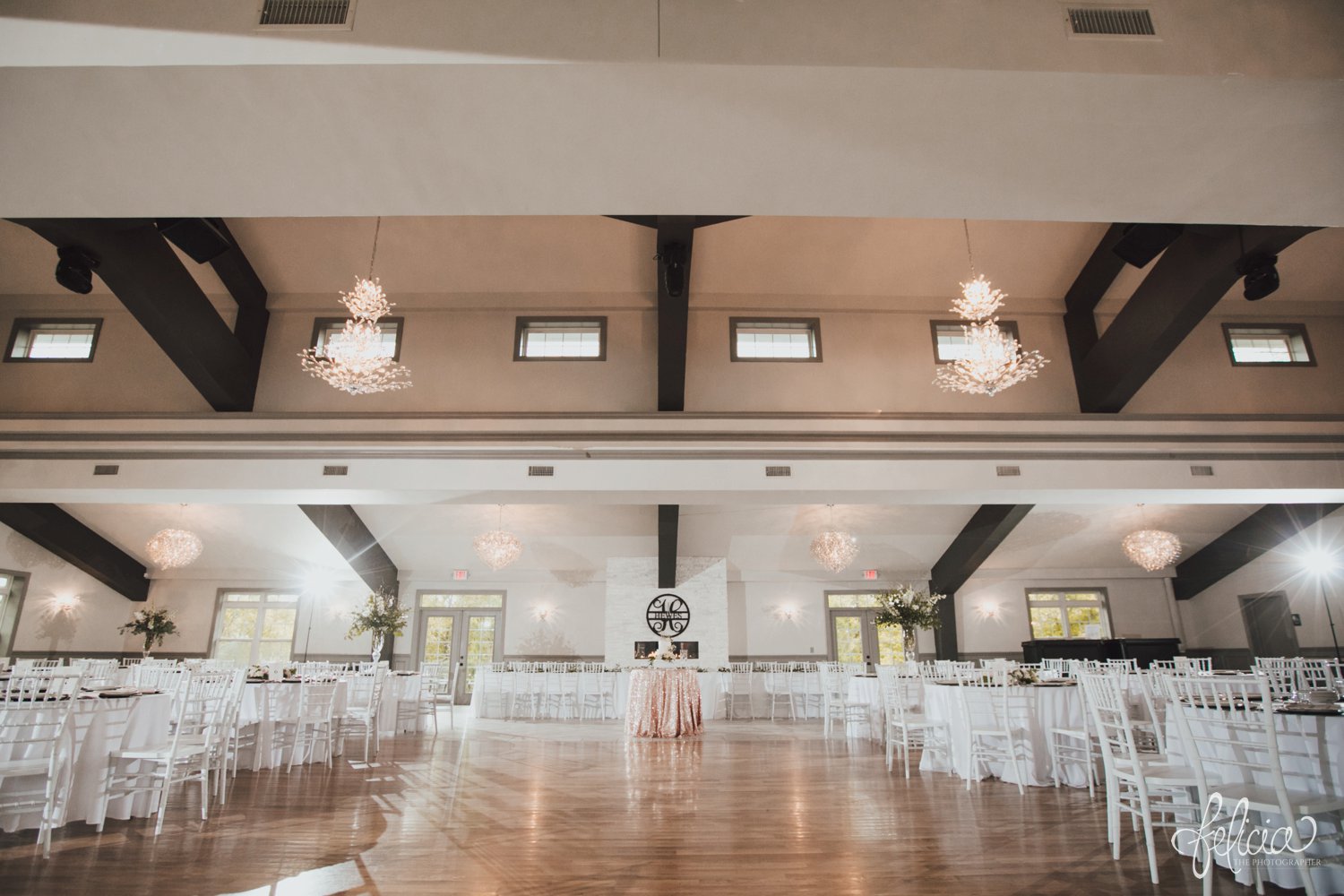 images by feliciathephotographer.com | destination wedding photographer | kansas city | eighteen ninety | classic | reception venue | white chairs | crisp | details | light pink head table | 