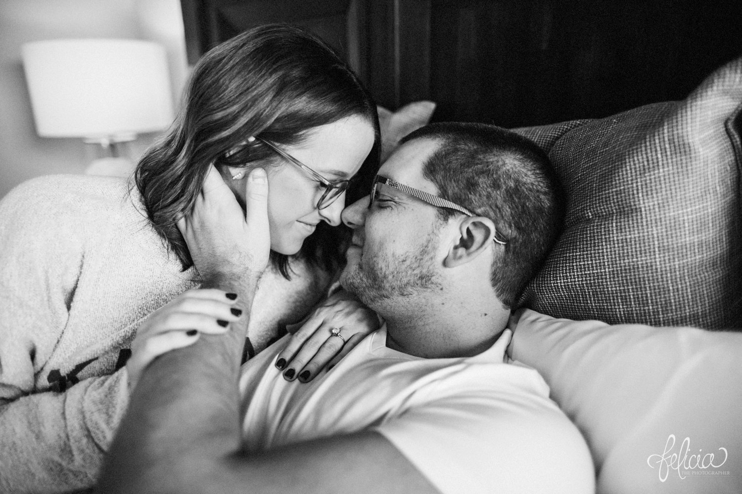 images by feliciathephotographer.com | destination photographer | engagement session | in home | lifestyle | kansas city | cozy | bed | jammies | snuggles | laughter | natural light | love | romantic | casual | black and white | 