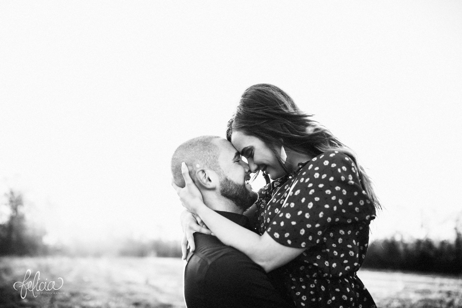 images by feliciathephotographer.com | Burr Oak Woods | engagement photos | wedding photographer | engagement photographer | field | sunrise | picked up | posing | posed | black and white | b&w | love | smiles | happiness | happy | floral dress | beard | 