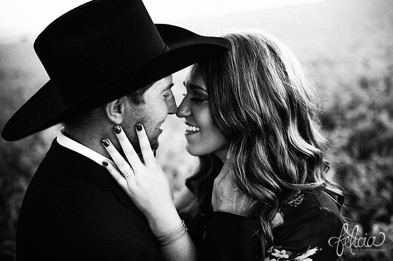 images by feliciathephotographer.com | engagement photographer | kansas farm | country | golden hour | sunset | romantic | true love | southern belle | bride to be | wheat field | cowboy hat | floral dress | black and white | diamond ring 