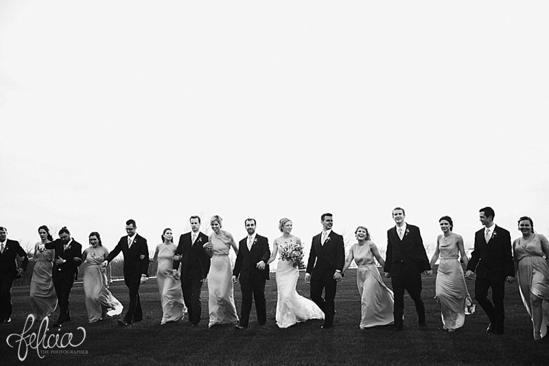 images by feliciathephotographer.com | mildale farm | destination wedding photographer | kansas | country | black and white | bridal party | portrait | walking | fun | celebration