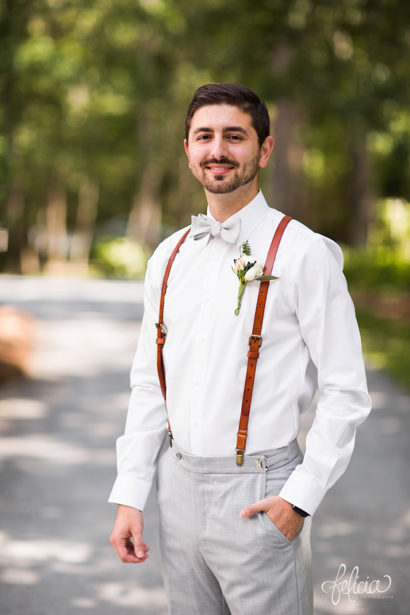 images by feliciathephotographer.com | destination wedding | the makey house | dave gibson coordinator | travel photographer | Savannah, georgia | southern | groom | pre-ceremony | details | boutonniere | brown suspenders | gray pants | bow tie | portrait 