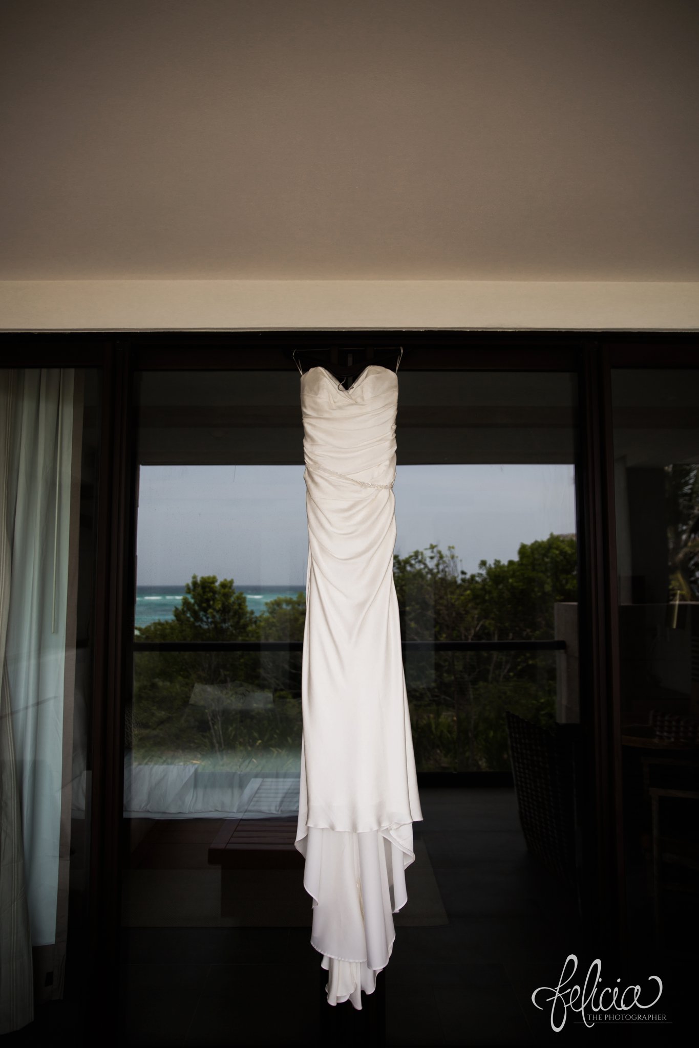 images by feliciathephotographer.com | Destination Beach Wedding | Unicco 20 87 | Photographer | L&S Travel | Casablanca Bridal | chic dress | ocean views | reflection 