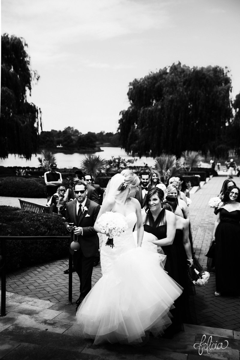 images by feliciathephotographer.com | destination wedding photographer | westin north shore | Chicago botanical gardens | bridal party | black and white portrait | walking | trees | 