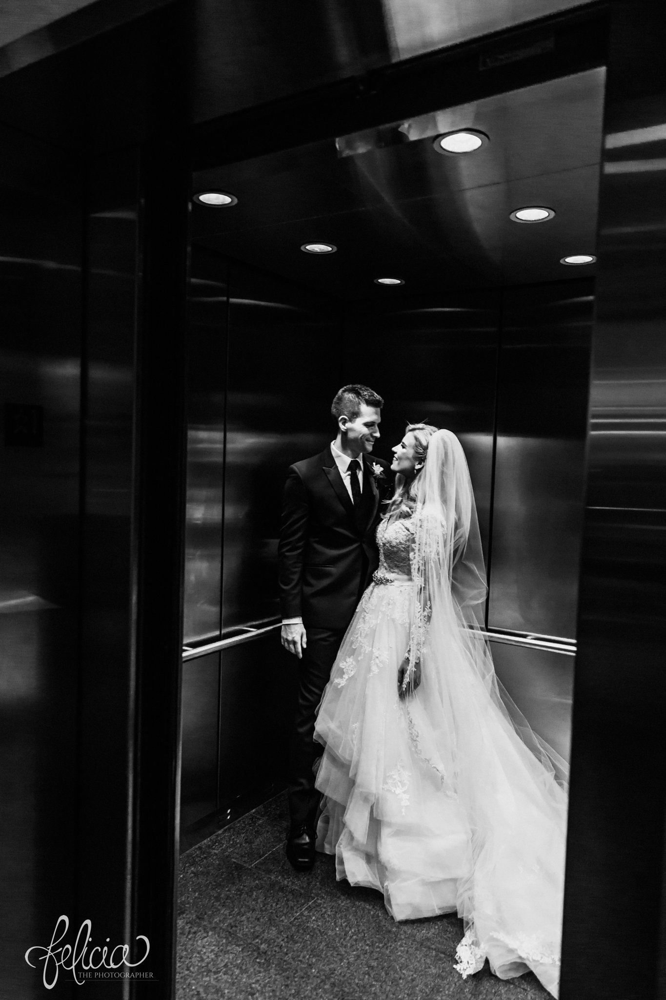 images by feliciathephotographer.com | wedding photographer | kansas city | redemptorist | classic | romantic | whimsical | black and white | tule train | portrait | lace long sleeve dress | true love | 