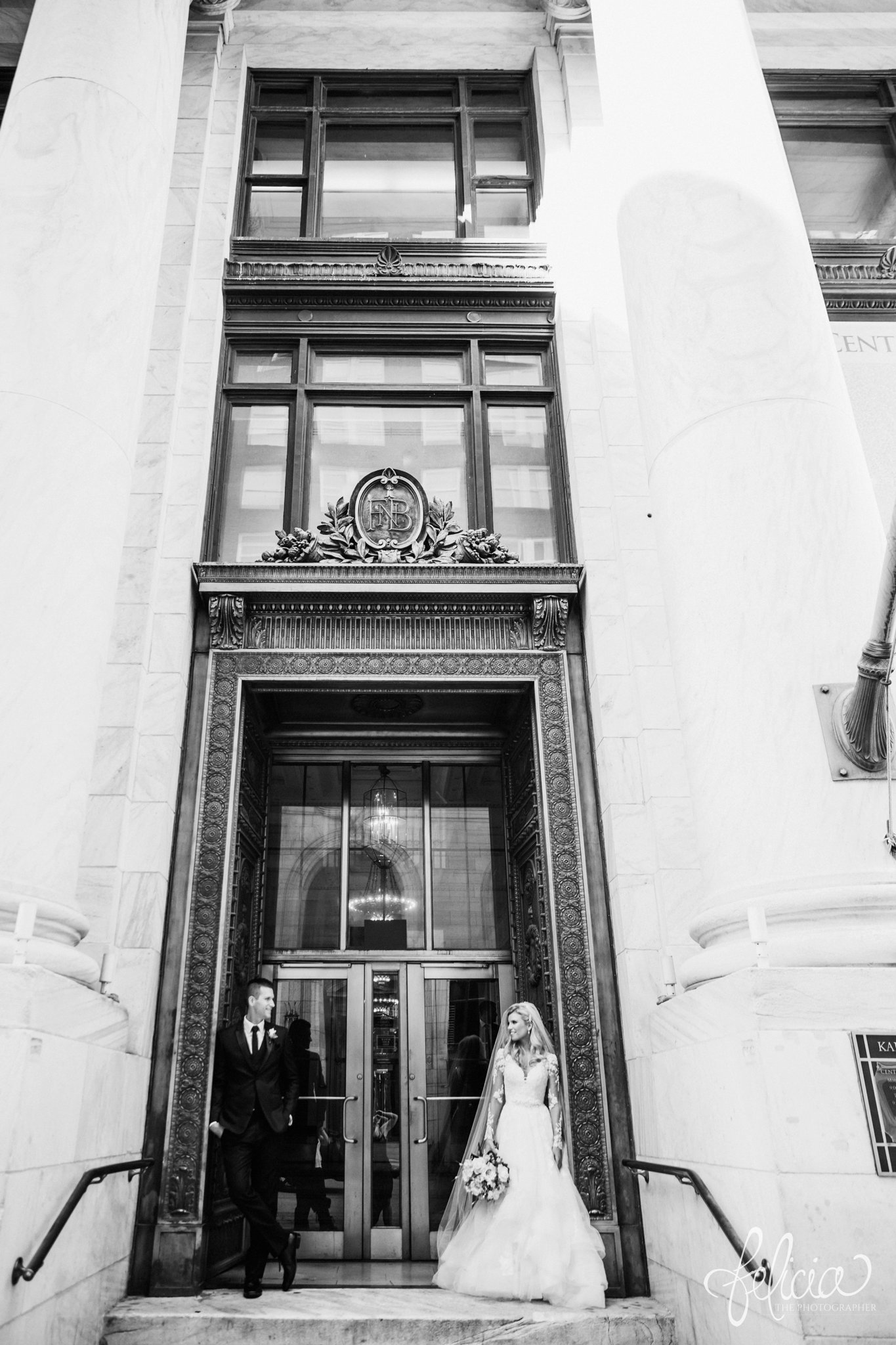 images by feliciathephotographer.com | wedding photographer | kansas city | redemptorist | classic | portrait | black and white | romantic | intimate | lace long sleeve dress | belle vogue | whimsical | glamor | library | power couple |
