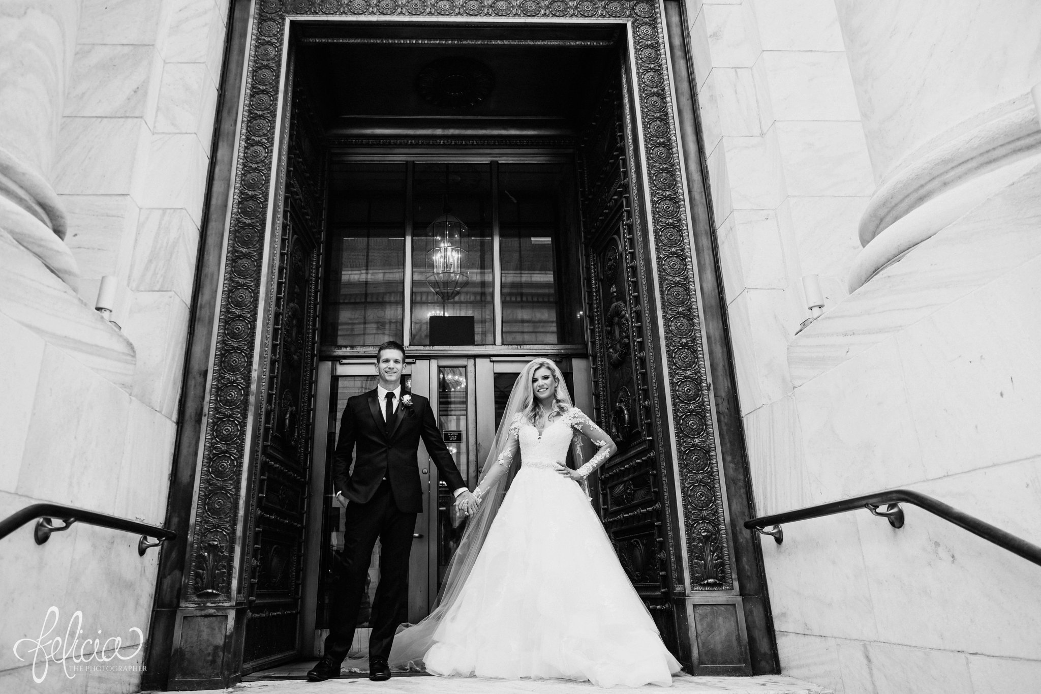 images by feliciathephotographer.com | wedding photographer | kansas city | redemptorist | classic | romantic | power couple | black and white | holding hands | lace dress | glamorous | library | 
