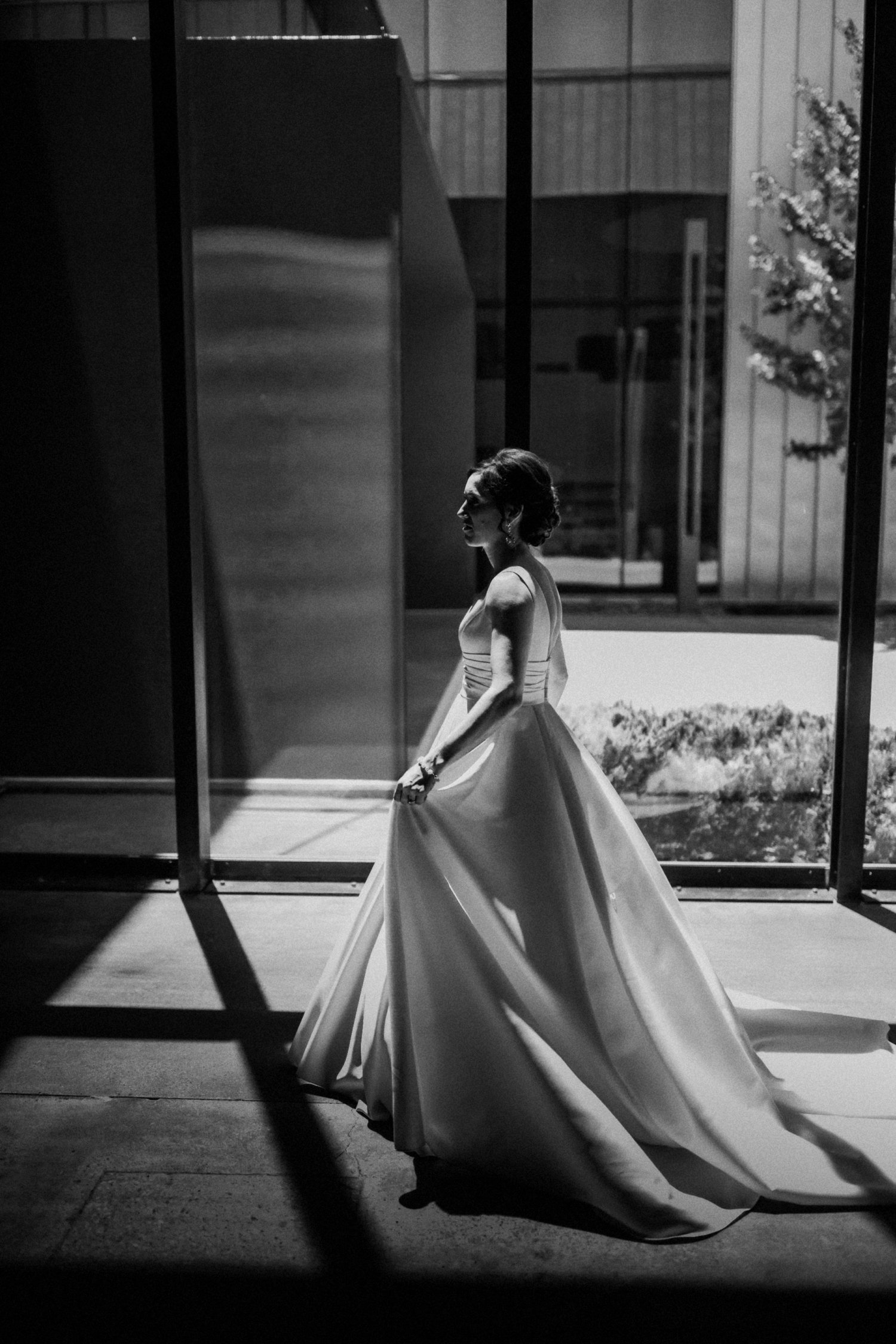  images by feliciathephotographer.com | destination wedding photographer | kansas city | spring time | first look | bride walking to groom | pre ceremony | black and white | satin a line dress | davids bridal | 