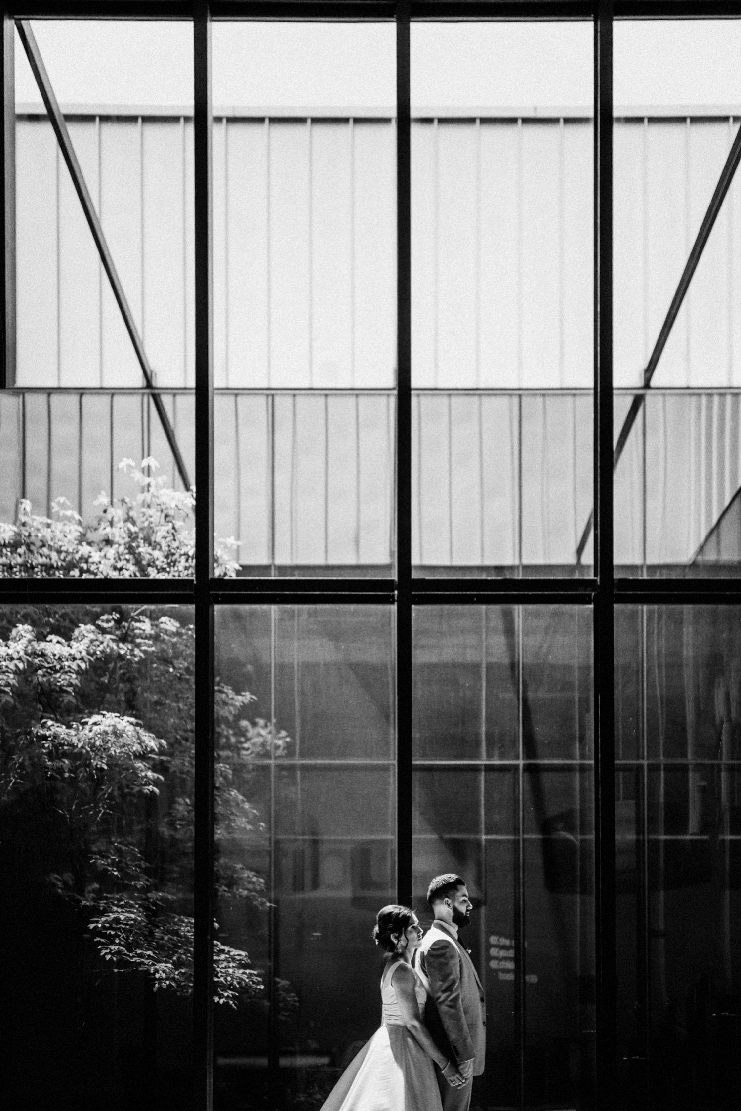  images by feliciathephotographer.com | destination wedding photographer | kansas city | spring time | pre ceremony | contrast | black and white | blooming trees | satin a line gown | davids bridal | grey suit | the black tux | 